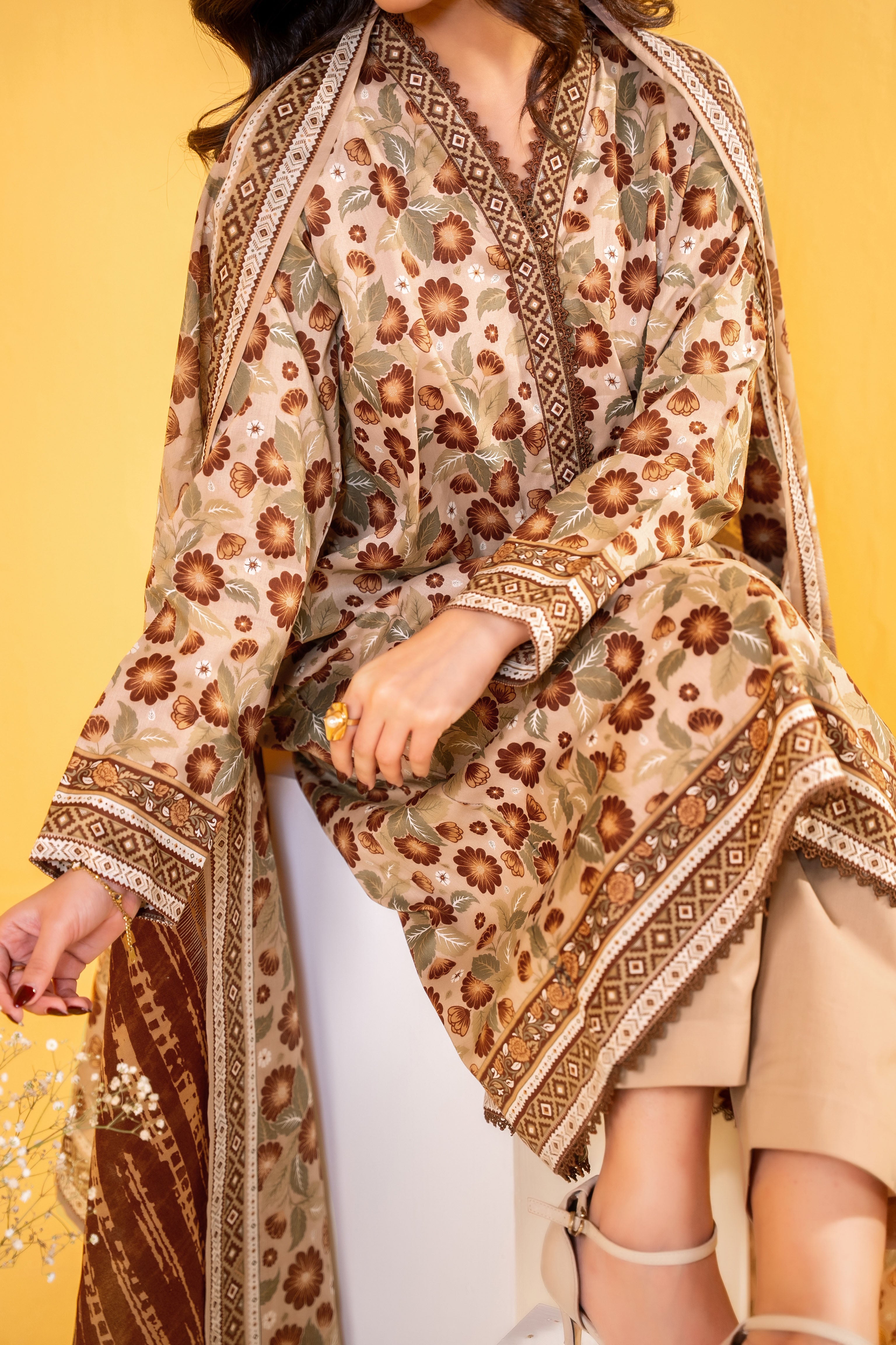 Light Brown printed 3 piece lawn suit for women with lawn dupatta and cambric trouser
Printed lawn shirt in black color for ladies