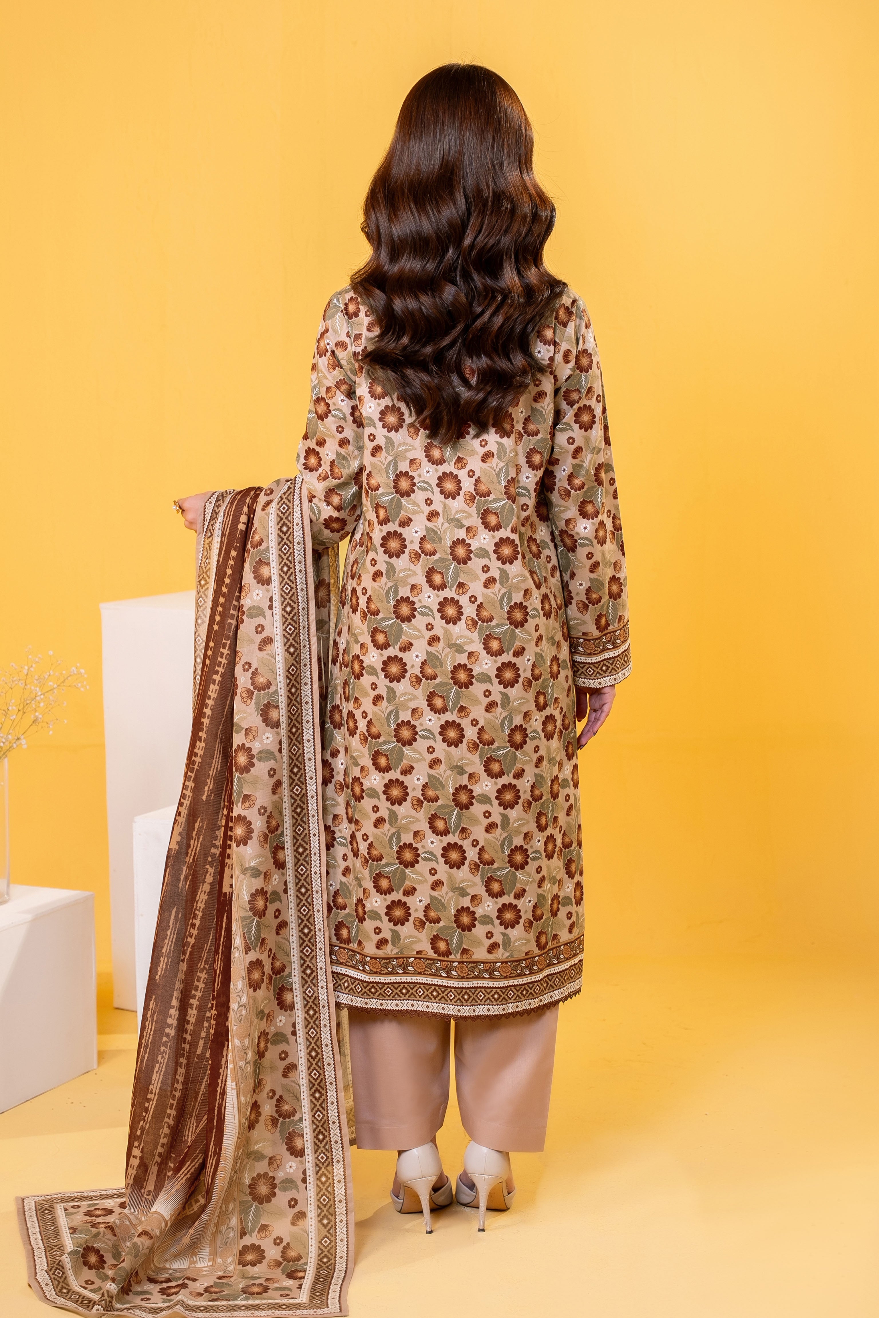 Light Brown printed 3 piece lawn suit for women with lawn dupatta and cambric trouser
Printed lawn shirt in black color for ladies