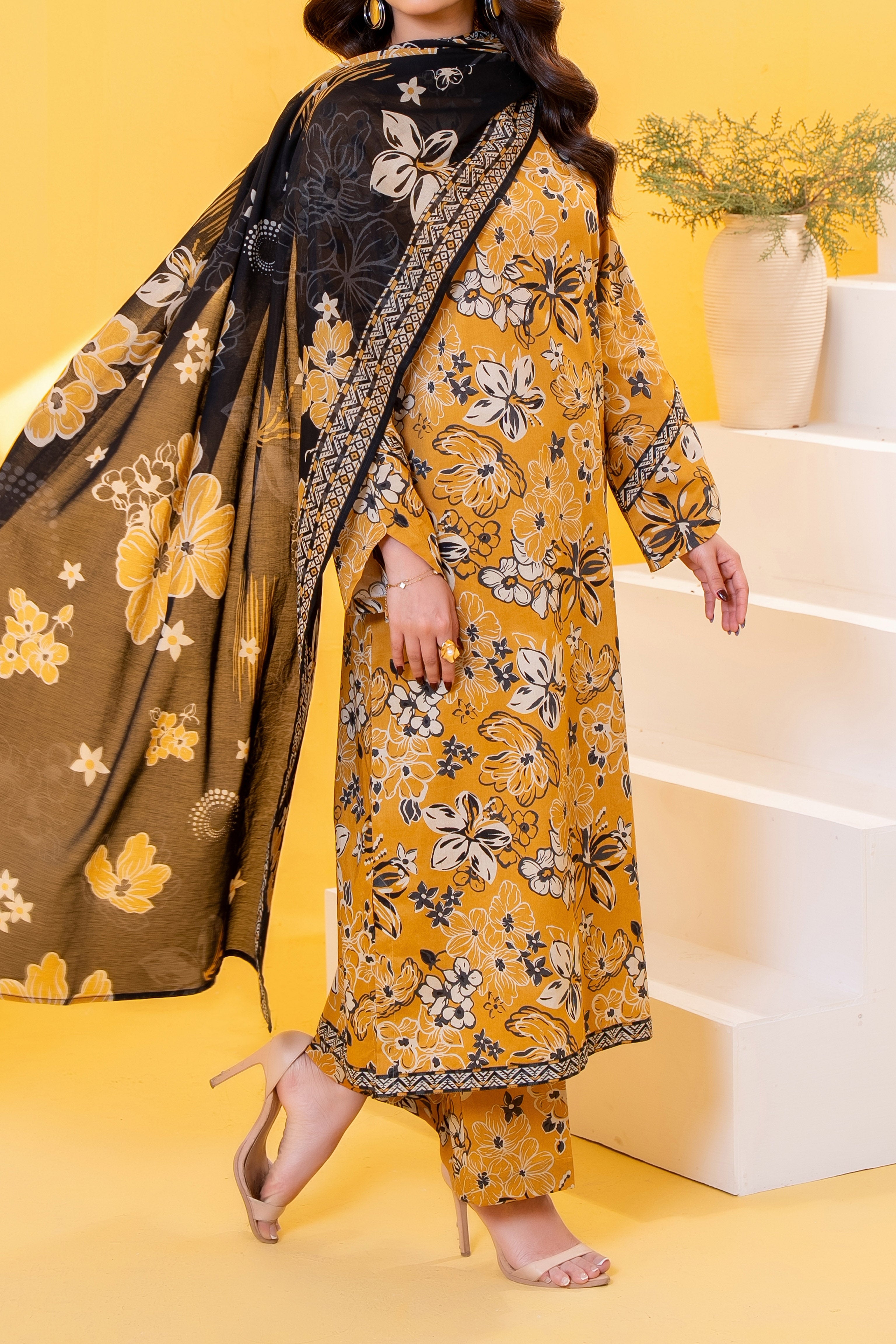 Yellow printed 3 piece lawn suit for women with lawn dupatta and cambric trouser
Printed lawn shirt in Yellow color for ladies