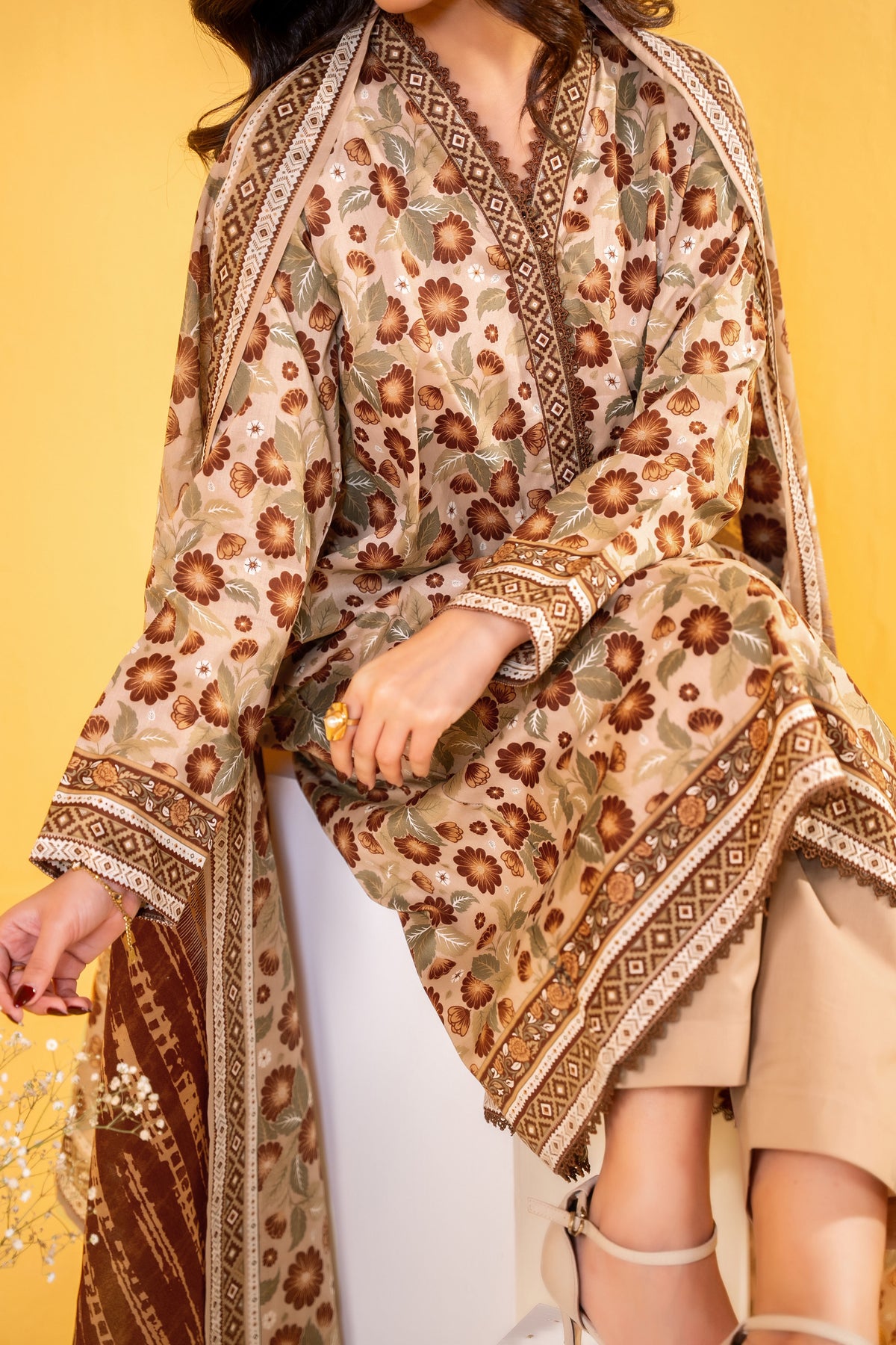 Light Brown printed 3 piece lawn suit for women with lawn dupatta and cambric trouser
Printed lawn shirt in black color for ladies
